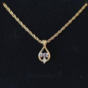 Nina Ricci teardrop logo necklace EUC